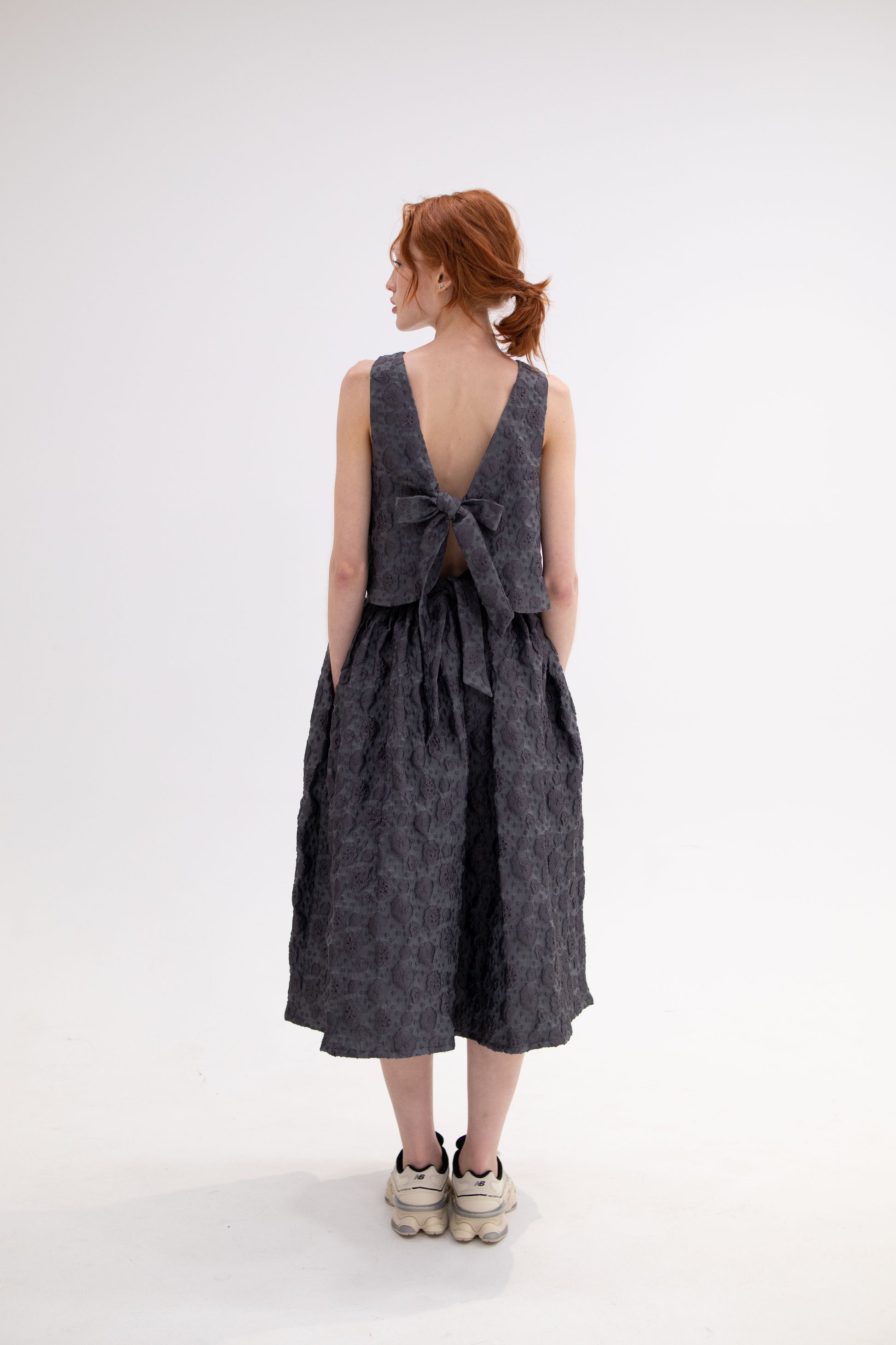 Monique grey, two piece ensemble with hand tied bow and cloud detail, romantic and sophisticated