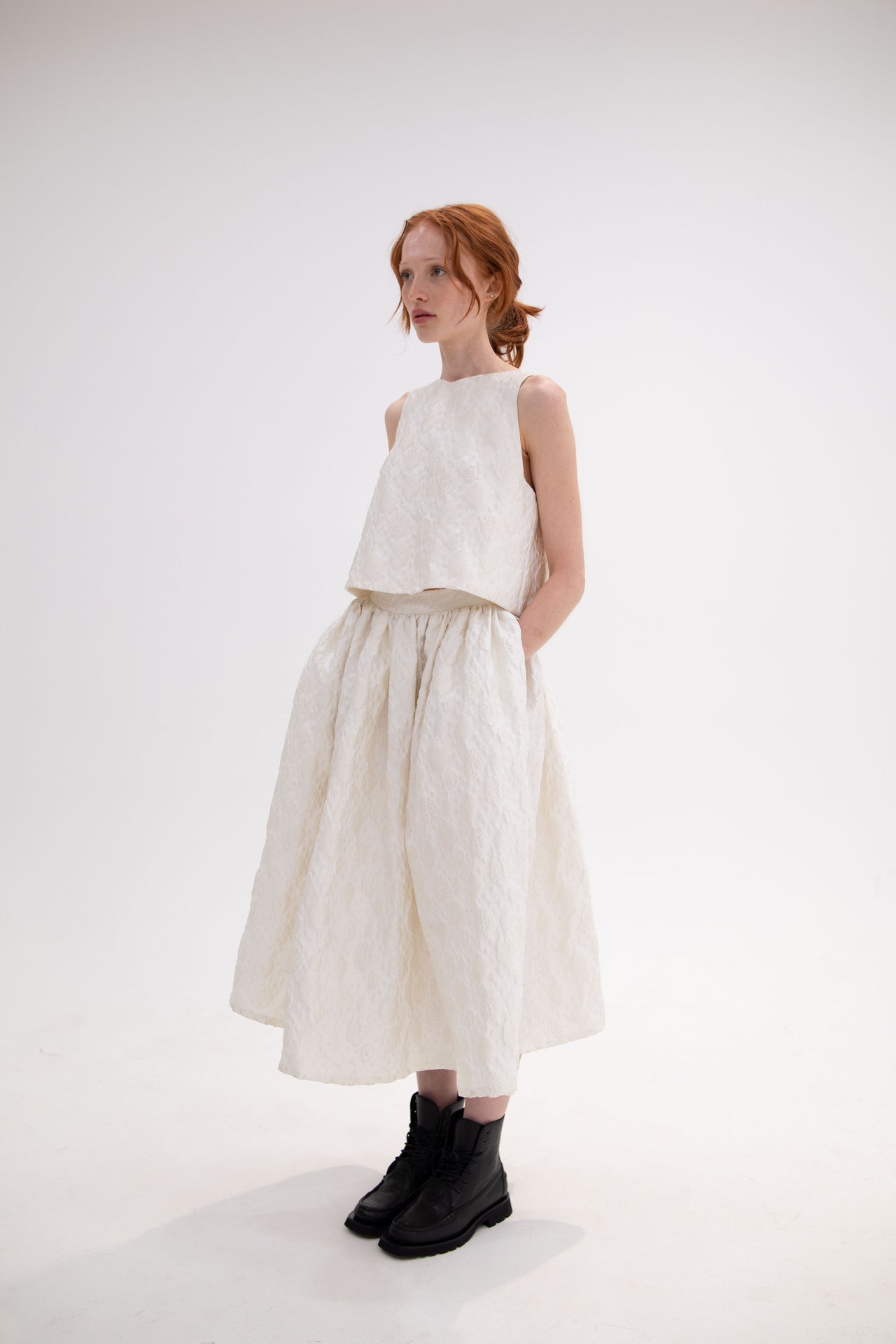 Monique white, two piece ensemble with hand tied bow and cloud details, romantic and sophisticated